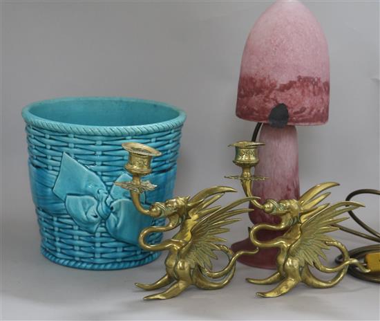 Two griffin brass candlesticks, a jardiniere and a glass lamp